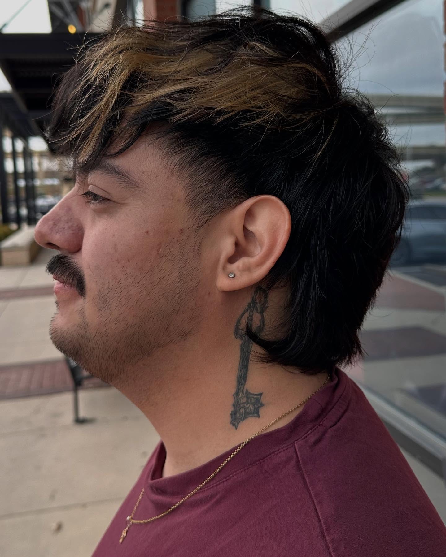 Man pleased with bleach & faded mullet.