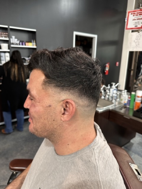 Client with fade and styled top.
