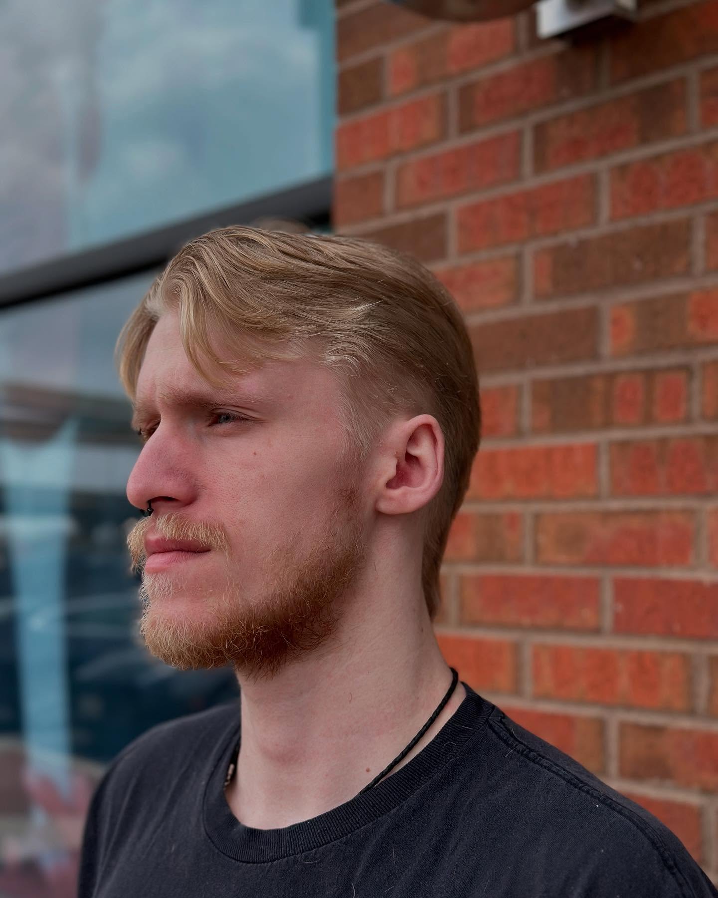 Blonde haired man with fresh new look.